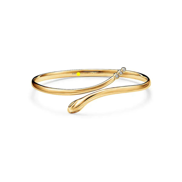 Snake Bangle in Yellow Gold with Diamonds